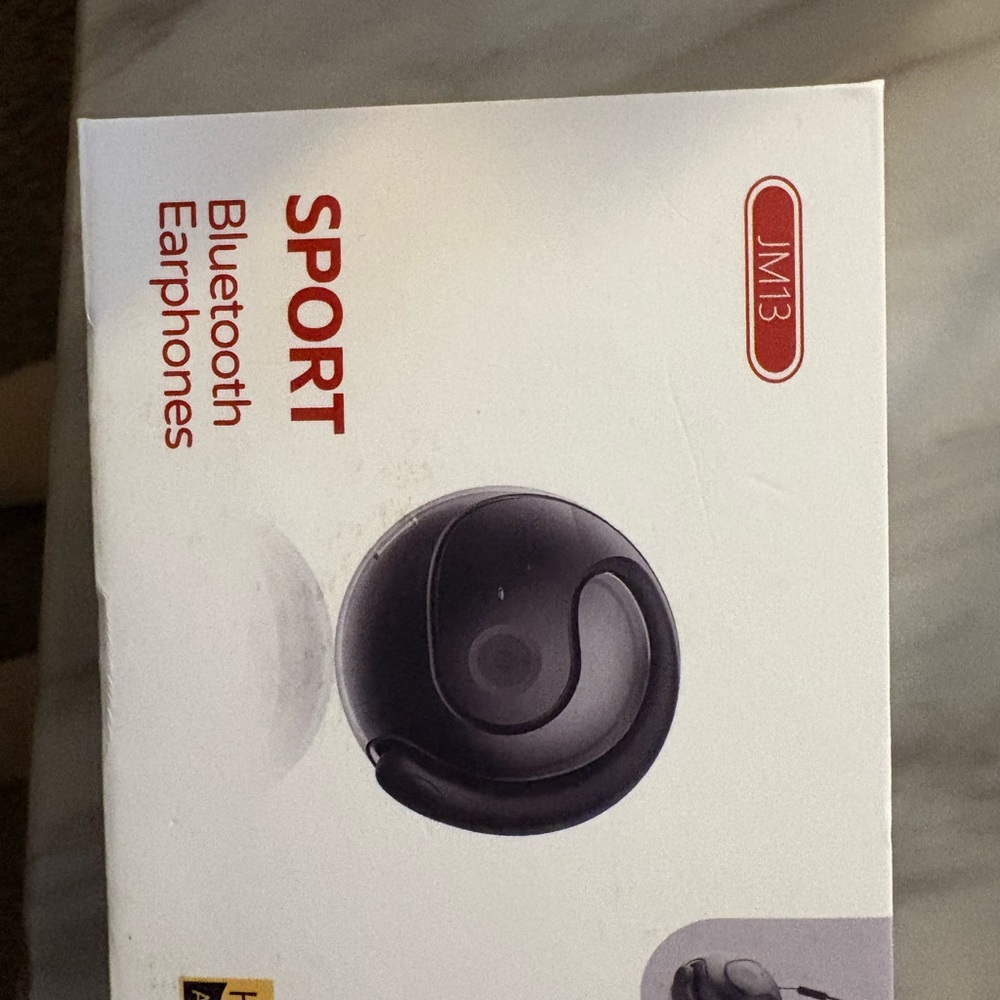 Purple Bluetooth earbuds used once